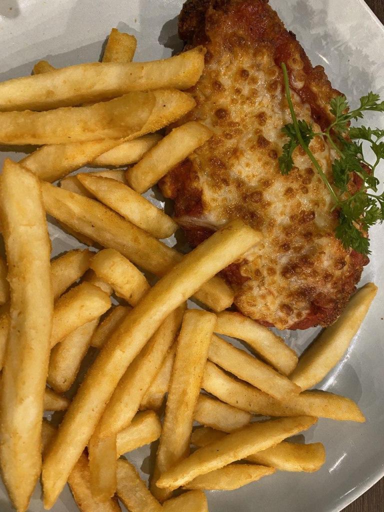 Parmy: Crumb chicken breast, Napolitana sauce, Mozzarella and chips, 18 AUD
